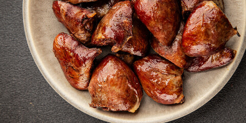 Heart turkey roasted offal poultry meat tasty snack fresh delicious gourmet food table background rustic food top view copy space