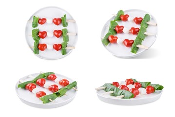 Mozzarella tomatoes basil appetizer in a plate for Valentine's day holidays on a white isolated background
