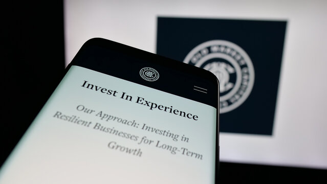 Stuttgart, Germany - 12-02-2025: Mobile phone with website of company Old Market Capital Corporation on screen in front of logo. Focus on top-left of phone display.