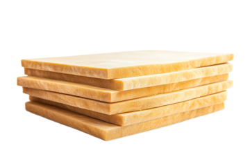 Stack of porous golden sponge rectangles for upholstery, isolated on transparent background