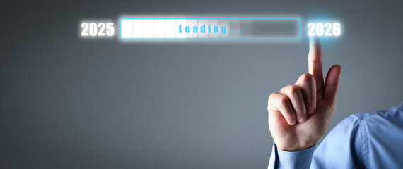 Businessman activating download on virtual screen against grey background, closeup. Loading of 2026 New Year