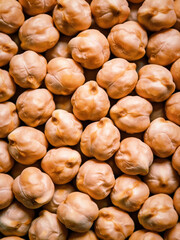 A close up of many small, round, yellow nuts