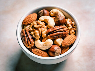 A bowl of nuts including walnuts, cashews, and almonds