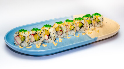 Plate of sushi rolls, California or Dragon roll variation, photographed on a white background, perfect for Japanese cuisine menus, food photography, and restaurant promotions.