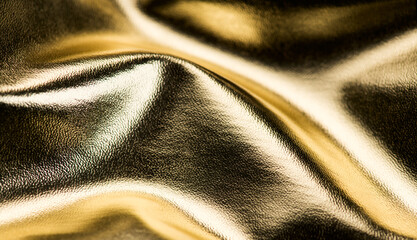 Golden leather texture background, glossy gold leather skin backdrop, fashion. 