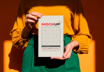 Design Woman Holdign Flyer Menu Mockup