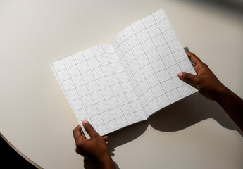 Open Book Magazine with Hands Mockup