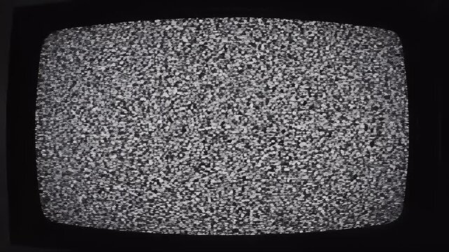 Vintage CRT television screen showing black and white analog static noise with no signal.