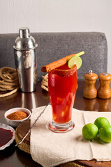 Homemade Michelada with Beer and  clamato, cocktail from mexico
