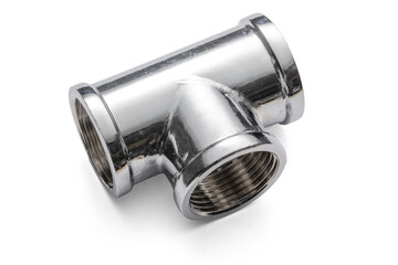 Close up of a metallic T-shaped pipe fitting on a transparent background. The tee is the pipe fitting used to connects the main and the branch pipeline