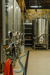industrial wine tanks in factory