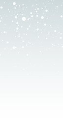 Fototapeta premium 9:16 A PNG image of falling snow with snowflakes and a bokeh effect on a transparent background.