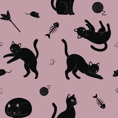 Seamless pattern with cute black cats. Playful kittens, fish bone and yarn on pink background.