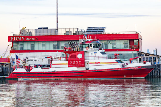 New-York, USA - 6.12.2025: Marine fire station marine 9 with fdny fireboat in New York harbor.