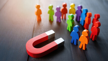 Customer attraction concept with magnet pulling colorful wooden figures, business lead generation strategy, marketing audience engagement, client acquisition funnel, targeted outreach