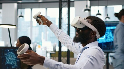 Admin using virtual reality tech, automating repetitive tasks with AI scripts. Employee wearing VR headset using artificial intelligence to speed up feature implementation, camera A