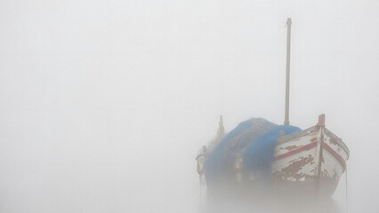 Authentic Traditional Fishing Boat Texture Detail Emerging From Thick Sea Fog And Mist