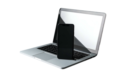 Laptop with blank screen beside a black smartphone, isolated on black. Shadows present