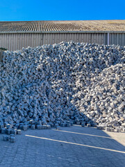 Large pile of granite cobblestones for construction project
