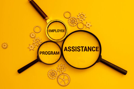 colored pen and paper with the word Employee Assistance Program or EAP.