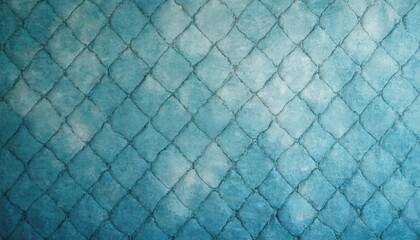 Naklejka premium Blue teal textured fabric displays repeating diamond pattern stitched with raised seams. This woven material features subtle color variations, smooth finish, suitable for upholstery or wall coverings.