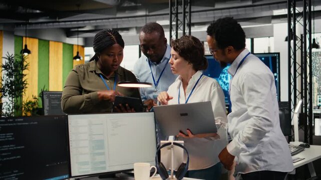 Portrait of smiling engineering team in office automating workflows using artificial intelligence tech. Happy coworkers refining deep learning computational models for faster processing, camera A
