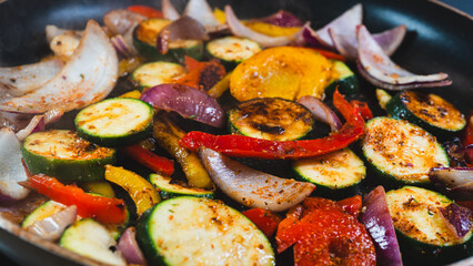 Colorful mix of cucumbers, red onions, mushrooms, and bell peppers sizzling in a pan, releasing steam. Sautéed to perfection—succulent, healthy, and full of natural flavor. Perfect side or main dish.