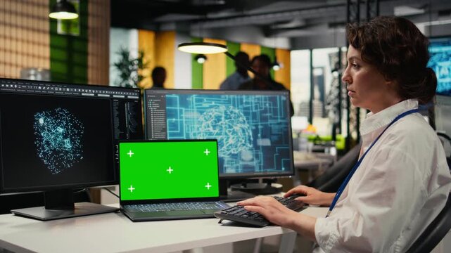 Isolated screen laptop used by engineer in startup office working with AI driving market innovation. Tech agency expert uses chroma key notebook to optimize operations with deep learning, camera A