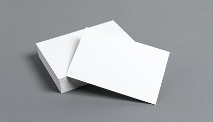 Blank business cards mockup on gray.