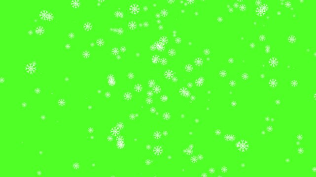 Snow and snowflakes falling on a green screen background