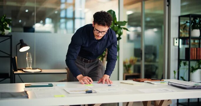 Planning, business man and writing in notebook for article reminder, schedule and deadline update. Journalist, person or paperwork with sticky notes at creative agency for story planner or organizing