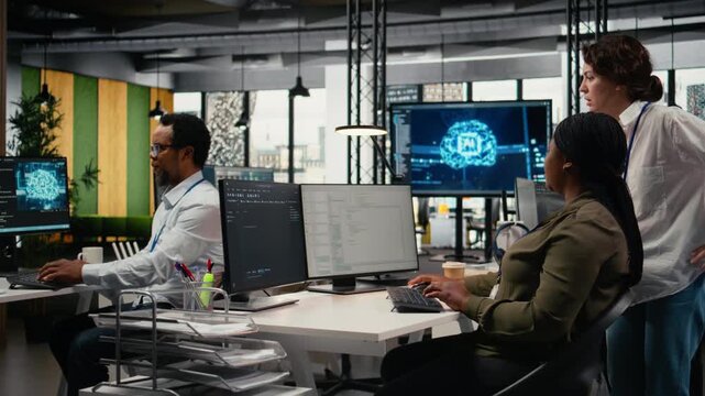 Team of technicians in office working together, automating workflows using AI. IT specialists collaborating to refine machine learning computational models for faster processing, camera A