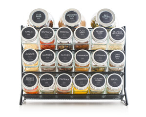 Assorted spices in glass jars with metal lids