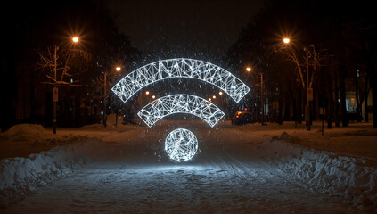 Glowing white wi fi symbol over snowy city street night