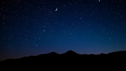 Fototapeta premium Crescent moon and stars over serene mountain silhouette