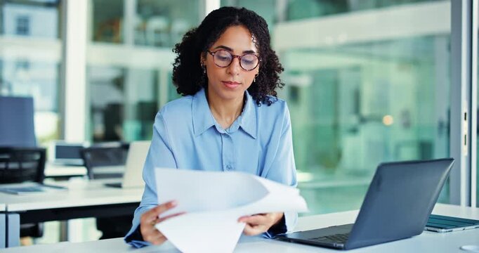 Laptop, documents and woman with reading for finance review, research and analytics. Office, tech and business person with glasses, graph and report for financial planning, audit or project budget