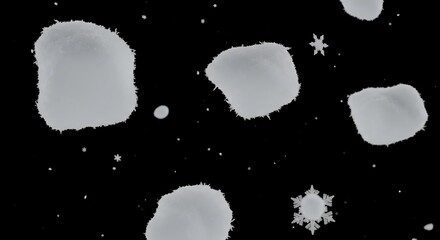 White frozen particles and crystalline structures drift against a deep dark background