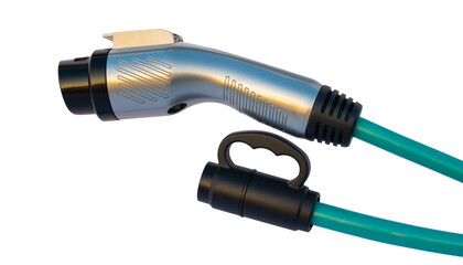 Close-up of an electric vehicle charging cable with a silver connector and teal cord on a white background, ready for use.