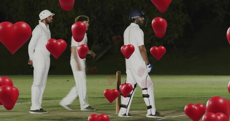 Bucket-hat fielder walking and kissing cricket batsman showing love while heart balloons appearing