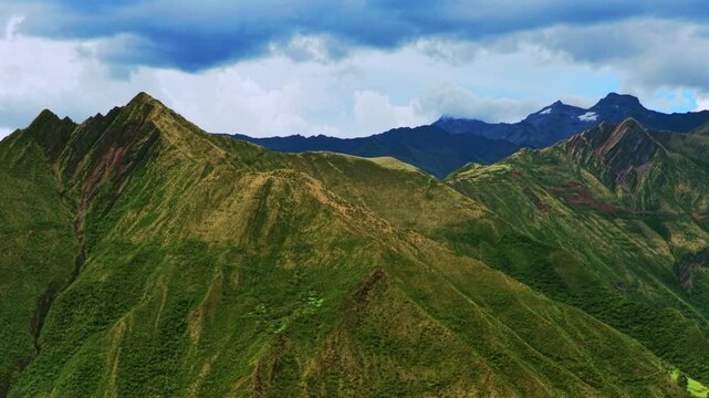 Limatambo mount Humantay Salkantay Peru aerial drone highlands avocado farm crops Peruvian Andes mountain range Cusco region Heertahuayco warm climate Soray rainy season clouds circle left motion