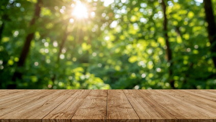 Empty wooden table under sunlit green foliage