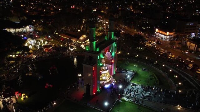 Christmas tree decoration projecting on lima friendship park arch