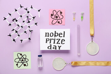 Paper with text NOBEL PRIZE DAY, molecular model, drawn molecules and medals on purple background