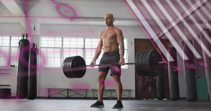 Man planting feet, gripping bar, driving legs, lifting and lowering, pink overlays passing, fitness