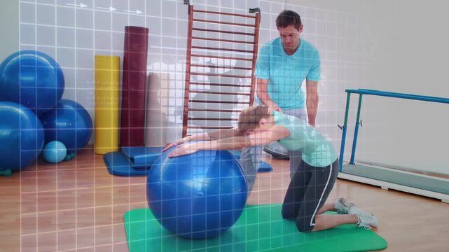Client kneeling on mat doing forward reaches after rehab physio placing hands for posture with ball