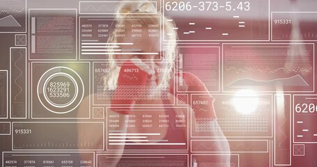 Female boxer starting with straight jab toward camera, training while HUD tracking punch metrics - Powered by Adobe