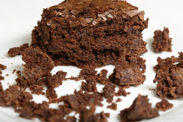 Brownie surrounded by crumbs