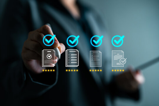 Document approval and quality control concept. Hand selecting five-star rated documents with checklist icons. Suitable for compliance, audit, legal, QA and business documentation processes.