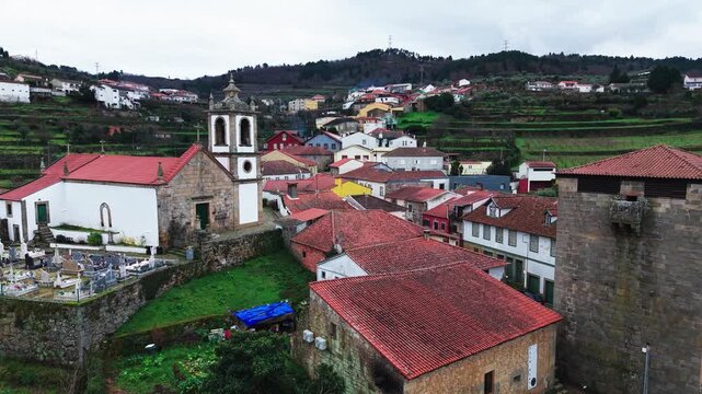 Ucanha historic village traditional homes, church, Viseu District of Northern Portugal, Establishing drone shot