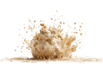 Beige liquid violently explodes against a dark backdrop